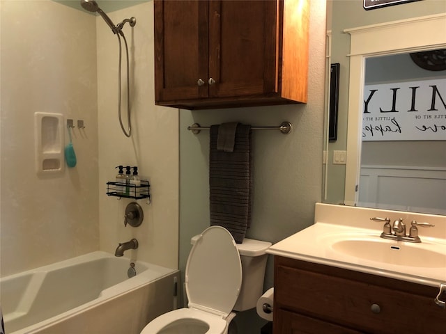 full bathroom with vanity, toilet, and shower / washtub combination