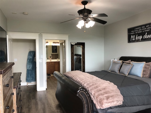 bedroom featuring ensuite bath, dark hardwood / wood-style floors, and ceiling fan