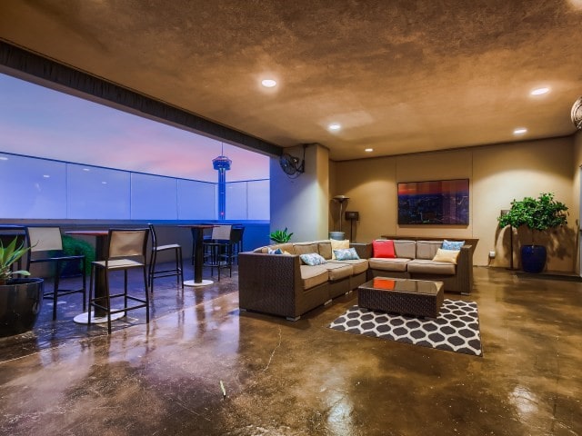 living room featuring concrete floors