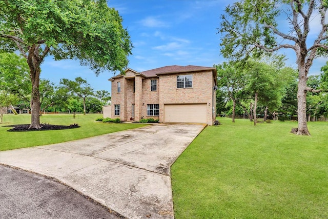 view of front of home with a garage and a front lawn