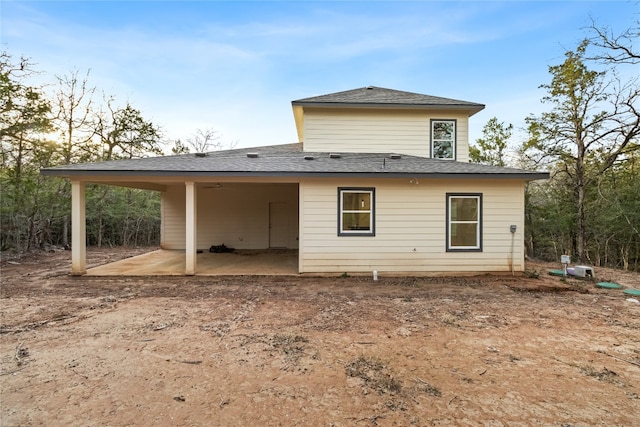 rear view of property featuring a patio