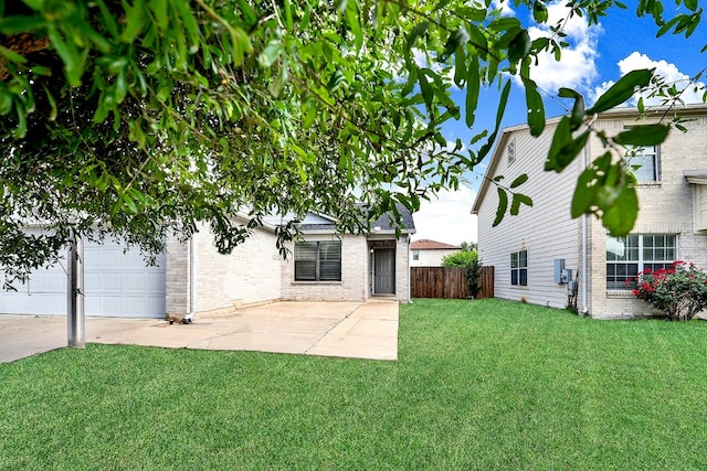 view of yard with a garage