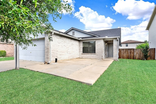 ranch-style home with a garage and a front lawn