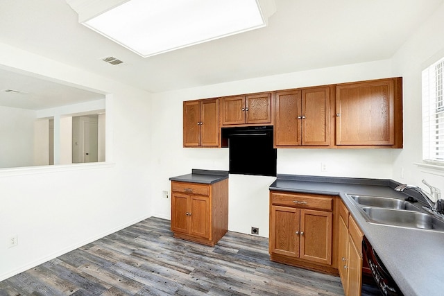 kitchen featuring dark hardwood / wood-style floors and sink