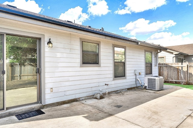 exterior space featuring a patio area and central AC unit