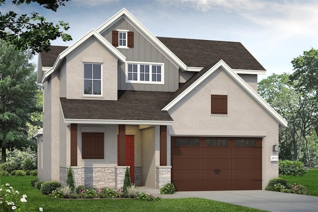 view of front facade with a front lawn and a garage