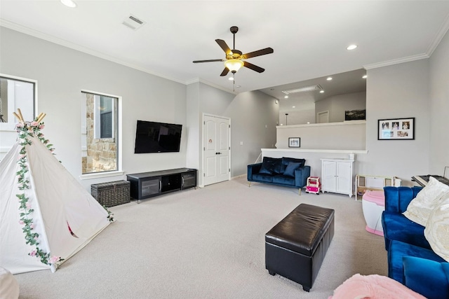 carpeted living room with ceiling fan and crown molding