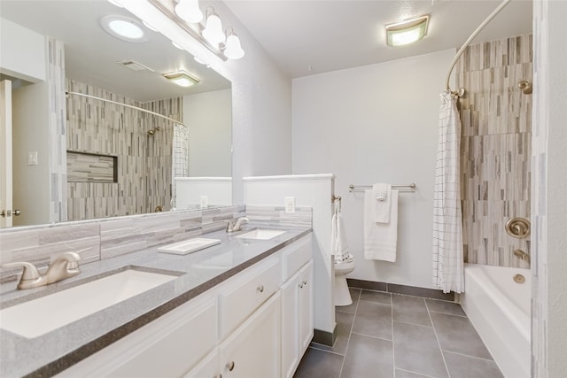 full bathroom with shower / bath combo with shower curtain, tasteful backsplash, tile patterned flooring, double sink vanity, and toilet