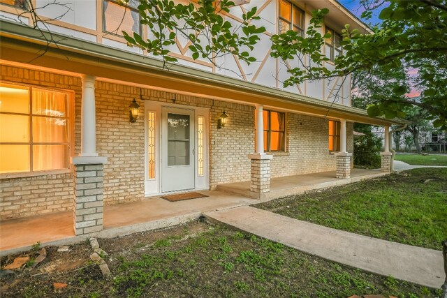 entrance to property with a porch