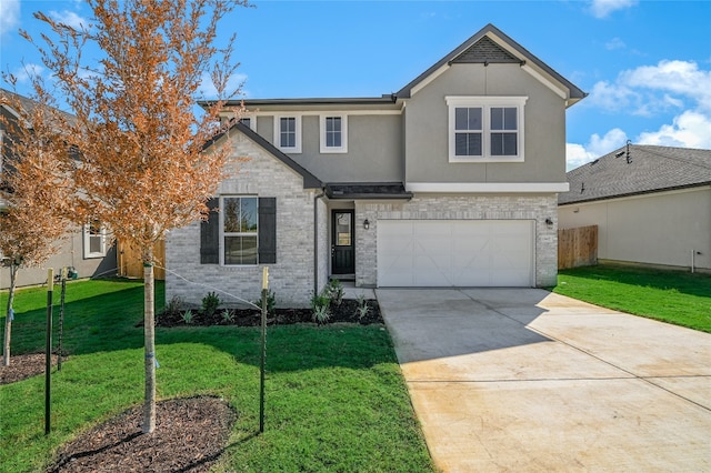 view of property featuring a garage and a front lawn