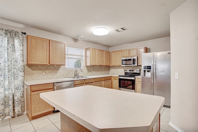 kitchen featuring a center island, backsplash, light brown cabinetry, stainless steel appliances, and sink