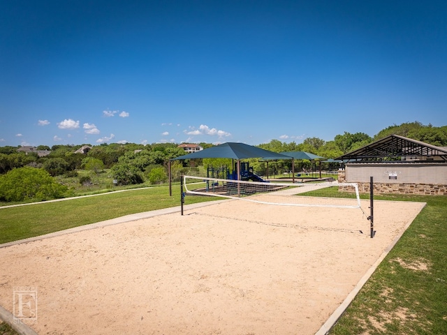 view of community with a gazebo, volleyball court, and a lawn