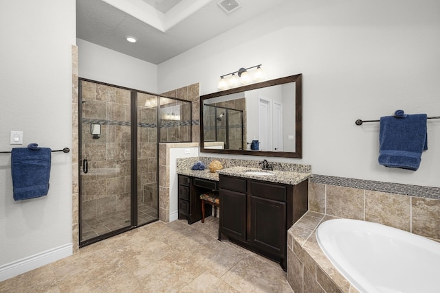 bathroom featuring vanity, shower with separate bathtub, and a textured ceiling