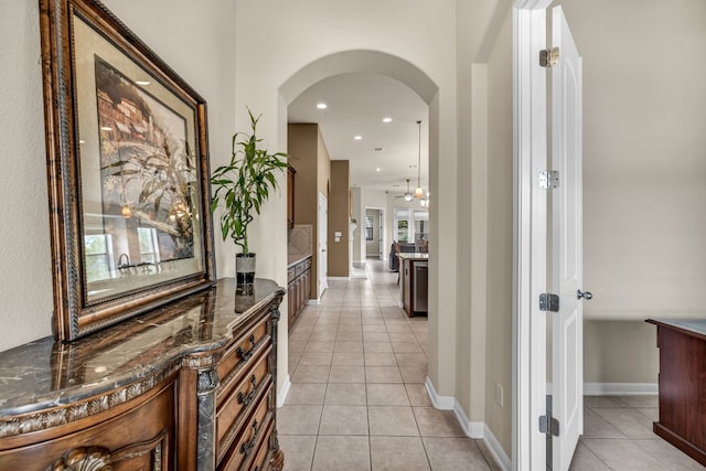 hall with light tile floors