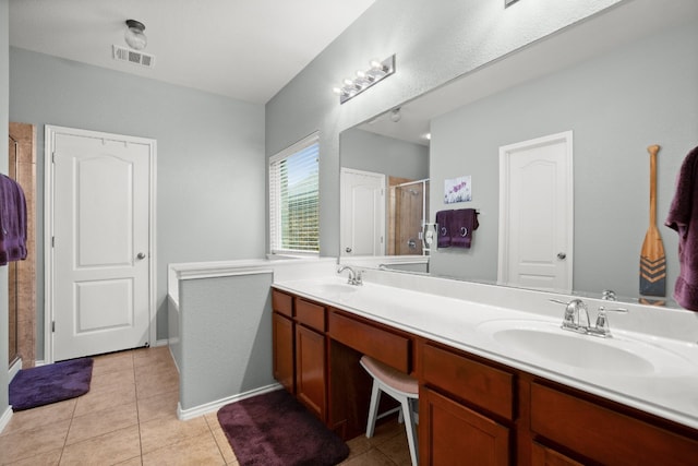 bathroom with walk in shower, dual bowl vanity, and tile floors