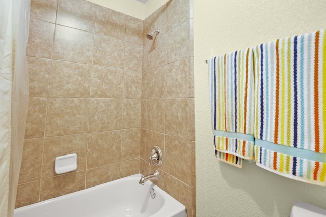 bathroom with shower / tub combo with curtain