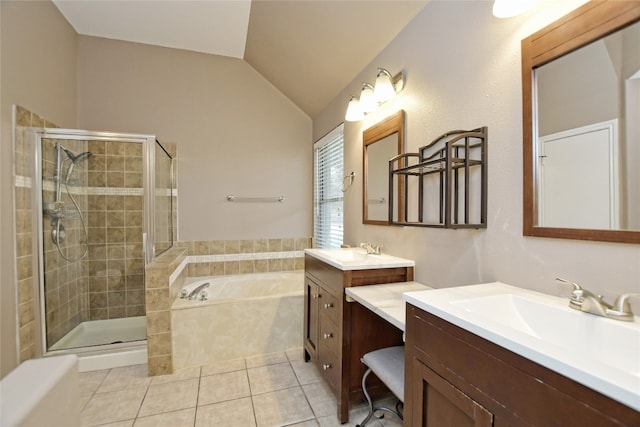 bathroom with separate shower and tub, lofted ceiling, tile patterned floors, and vanity