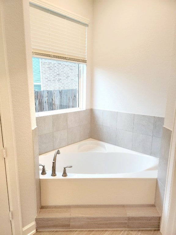 bathroom featuring a bathing tub