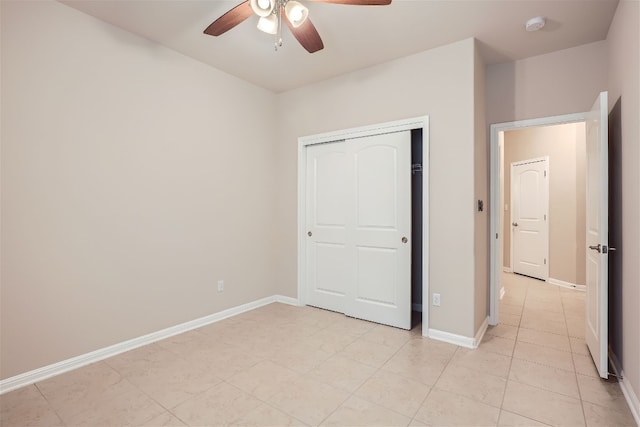 unfurnished bedroom featuring a closet, ceiling fan, and light tile floors