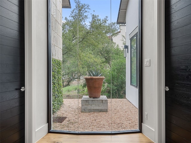 doorway with light hardwood / wood-style floors