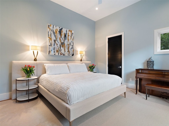 carpeted bedroom featuring ceiling fan