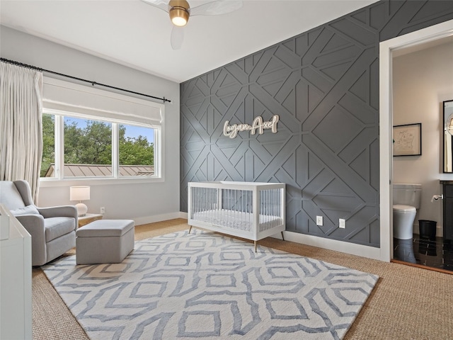 living area with ceiling fan and carpet floors