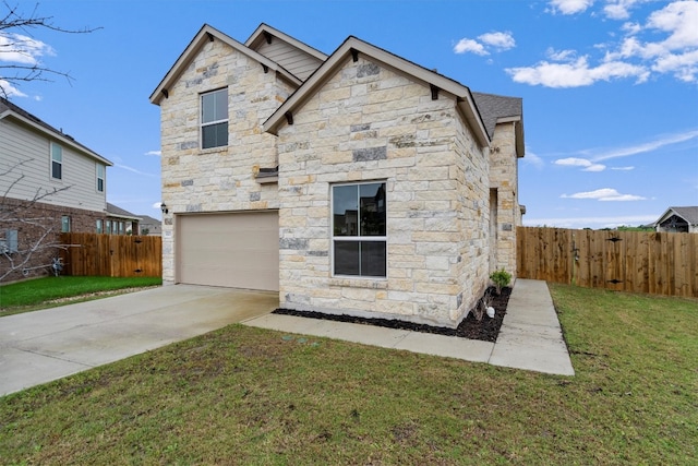 view of front of house with a front lawn and a garage