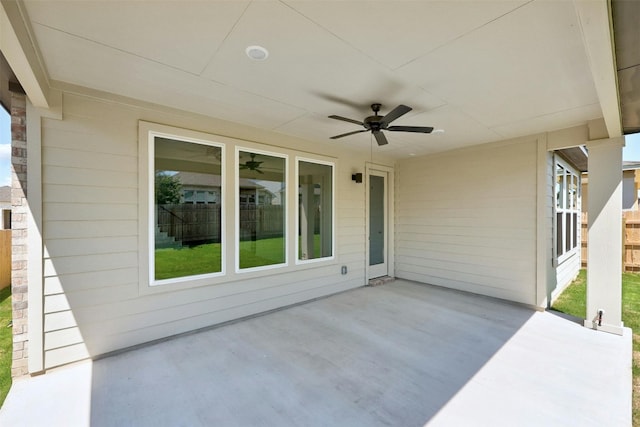 view of patio featuring ceiling fan