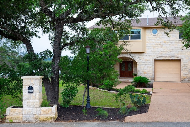 view of front of property with a garage