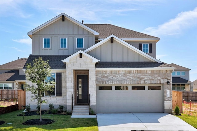 view of front facade with a front lawn and a garage