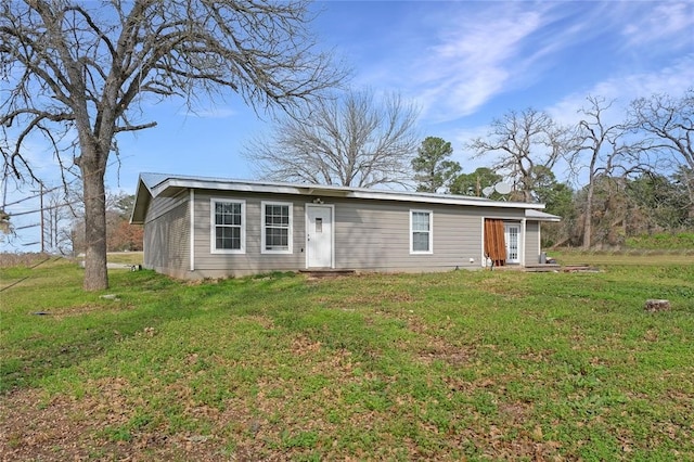 view of front of home with a front yard