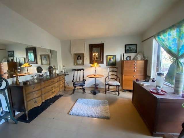 home office with light tile floors