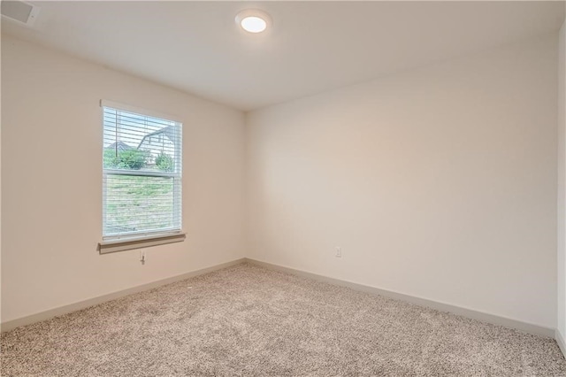 empty room featuring carpet floors