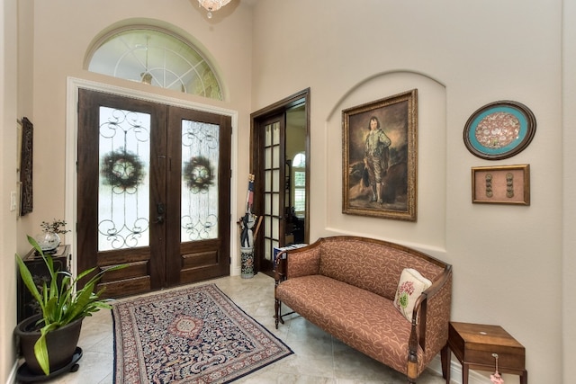 tiled foyer with french doors