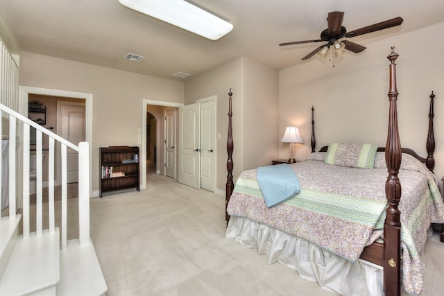 carpeted bedroom featuring ceiling fan