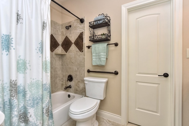 bathroom with toilet, tile floors, and shower / tub combo with curtain