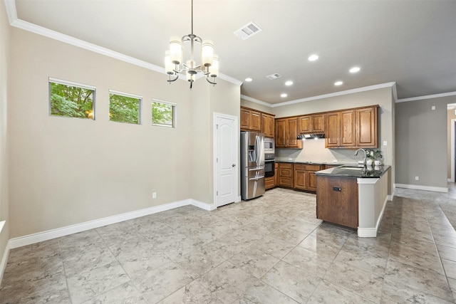 kitchen featuring sink, appliances with stainless steel finishes, tasteful backsplash, decorative light fixtures, and kitchen peninsula