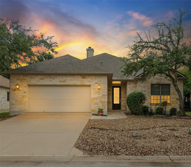 view of front of home with a garage