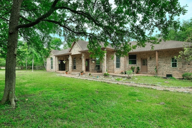 back of house with a yard