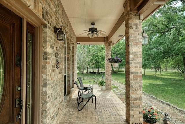 view of patio / terrace featuring ceiling fan