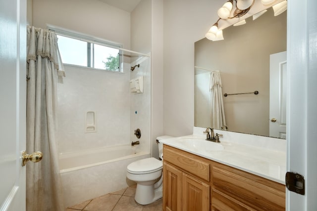 full bathroom with vanity with extensive cabinet space, toilet, tile floors, and shower / tub combo with curtain