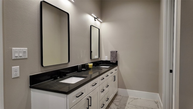 bathroom featuring tile flooring and double sink vanity