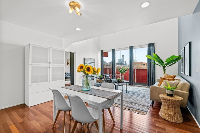 dining space featuring hardwood / wood-style flooring