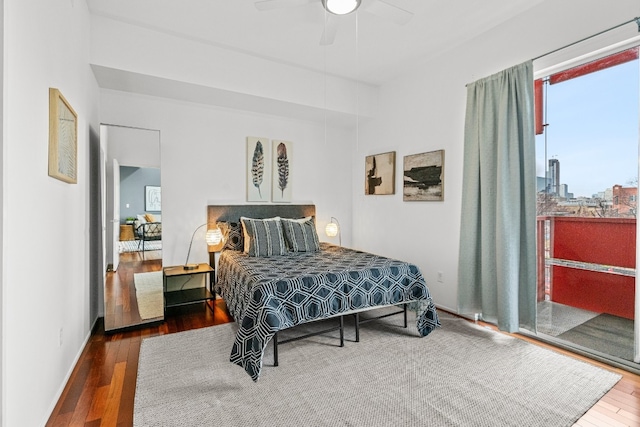 bedroom featuring ceiling fan and dark hardwood / wood-style floors