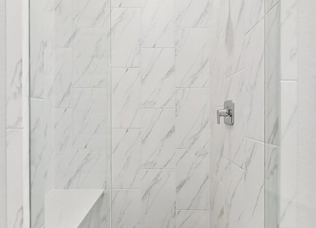 226 Flora Springs Cv, Liberty Hill, TX 78642 - bathroom view of a tile shower