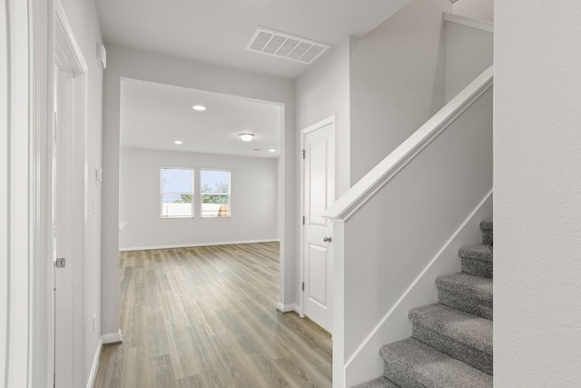 hallway featuring light hardwood / wood-style floors