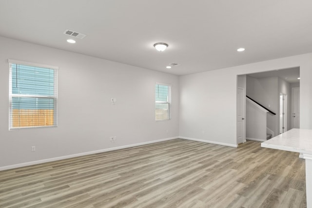 empty room with light wood-type flooring