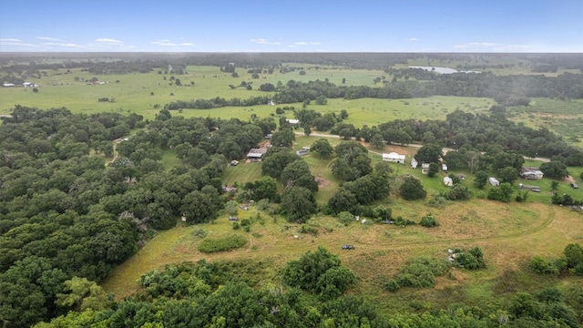 birds eye view of property with a rural view