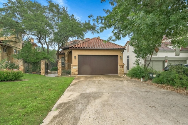 mediterranean / spanish home with a front yard