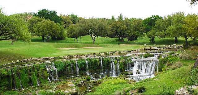 surrounding community featuring a yard